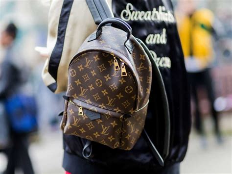 fake louis vuitton backpack vs real|authentic louis vuitton label.